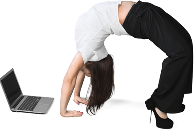 Woman working at her laptop in a yoga pose